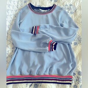 Blue top with beautiful and colorful accents